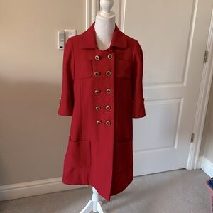Red double breasted wool blend coat.